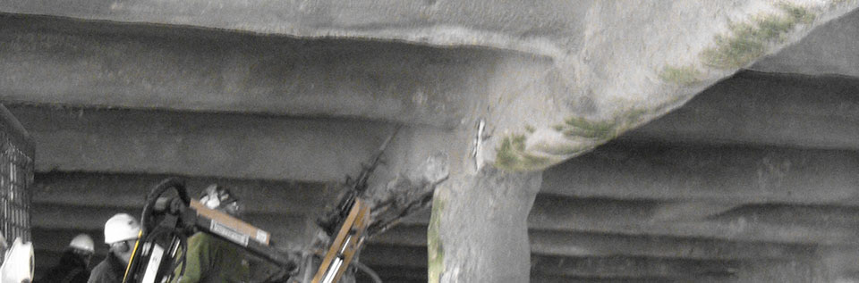 Overhead bridge cement chipping